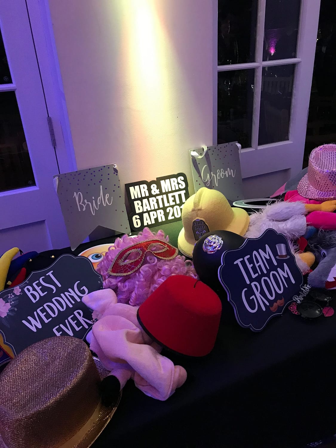 table with photo booth props